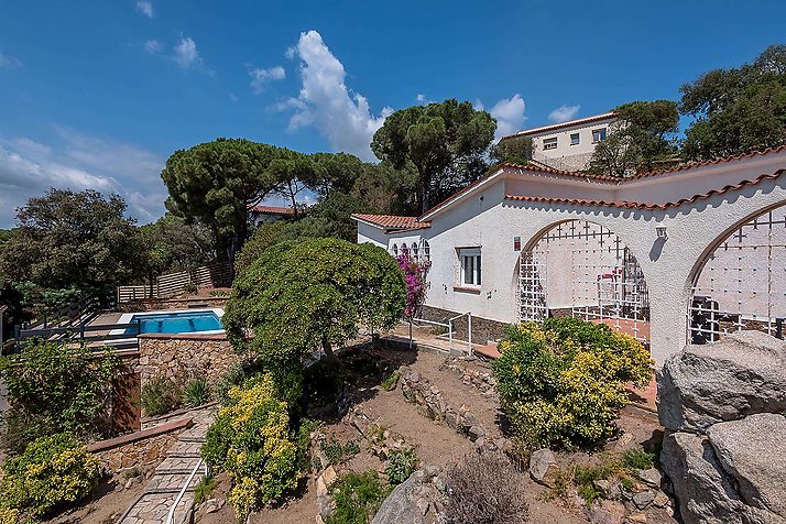 Detached villa with pool and sea views.