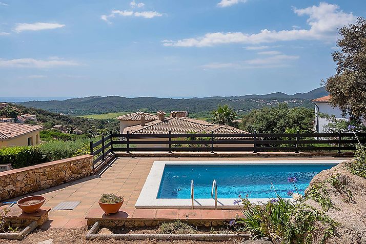 Detached villa with pool and sea views.